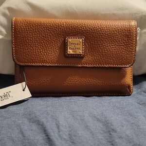 Dooney & Bourke Tan Wristlet.